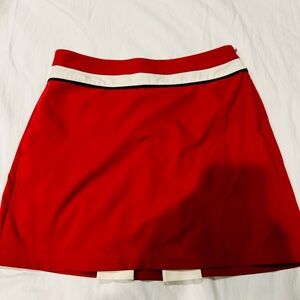 Izod Women’s Golf Skort with cute pleated back.